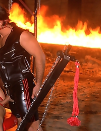 Big brutal fetish orgy with leather suits chains and fire
